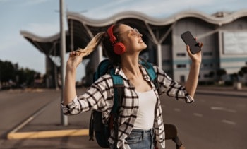 charming blonde girl sunglasses red headphones listens music min